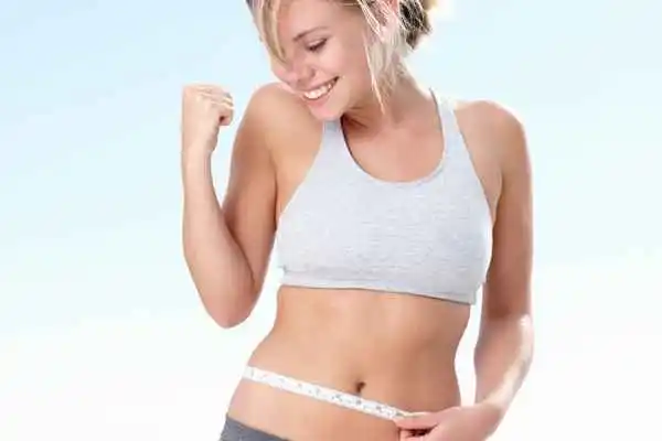woman happy after fat reduction treatment Wigan